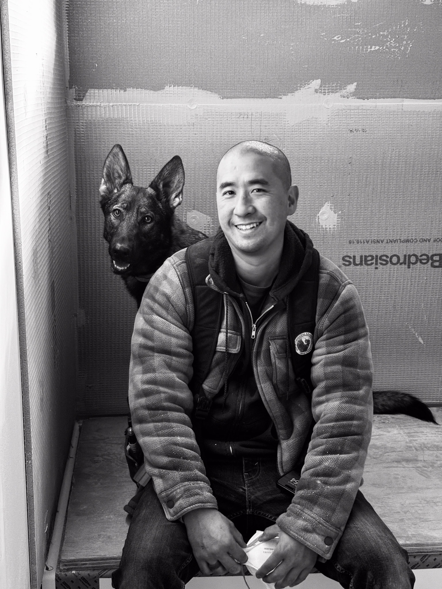 Hai and his dog Islay on a jobsite
