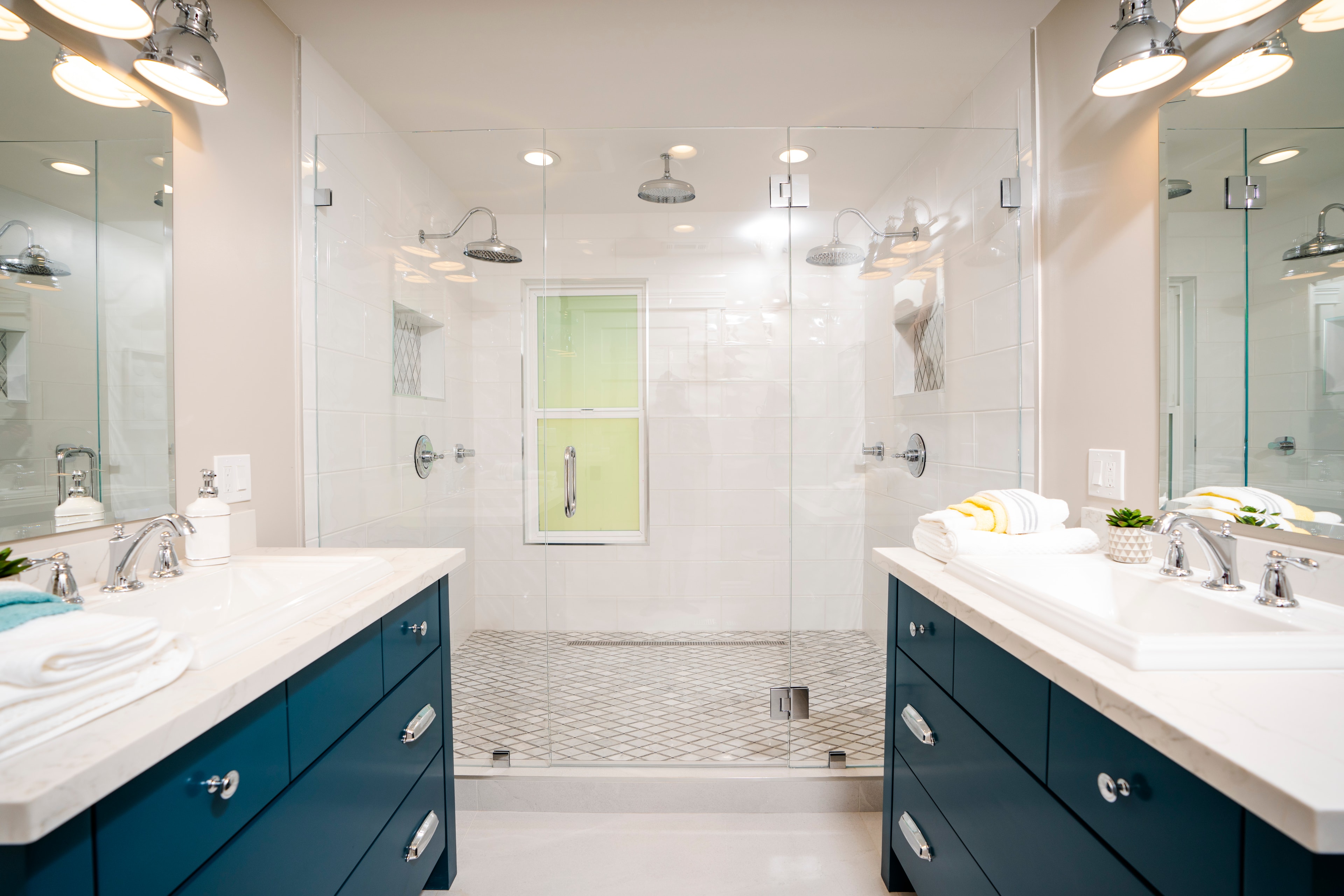 Navy dual-vanity bathroom