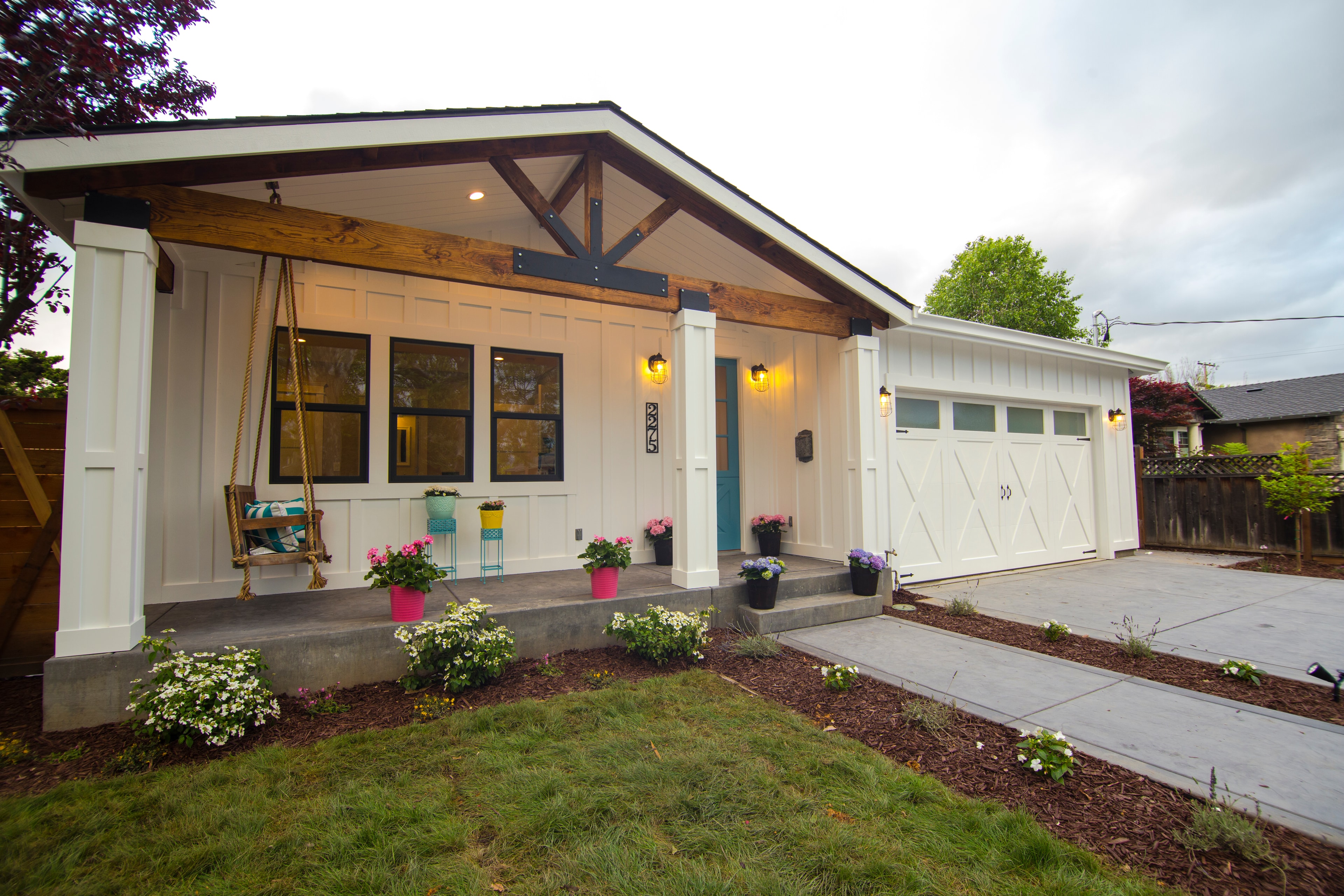 Modern farmhouse exterior, daytime