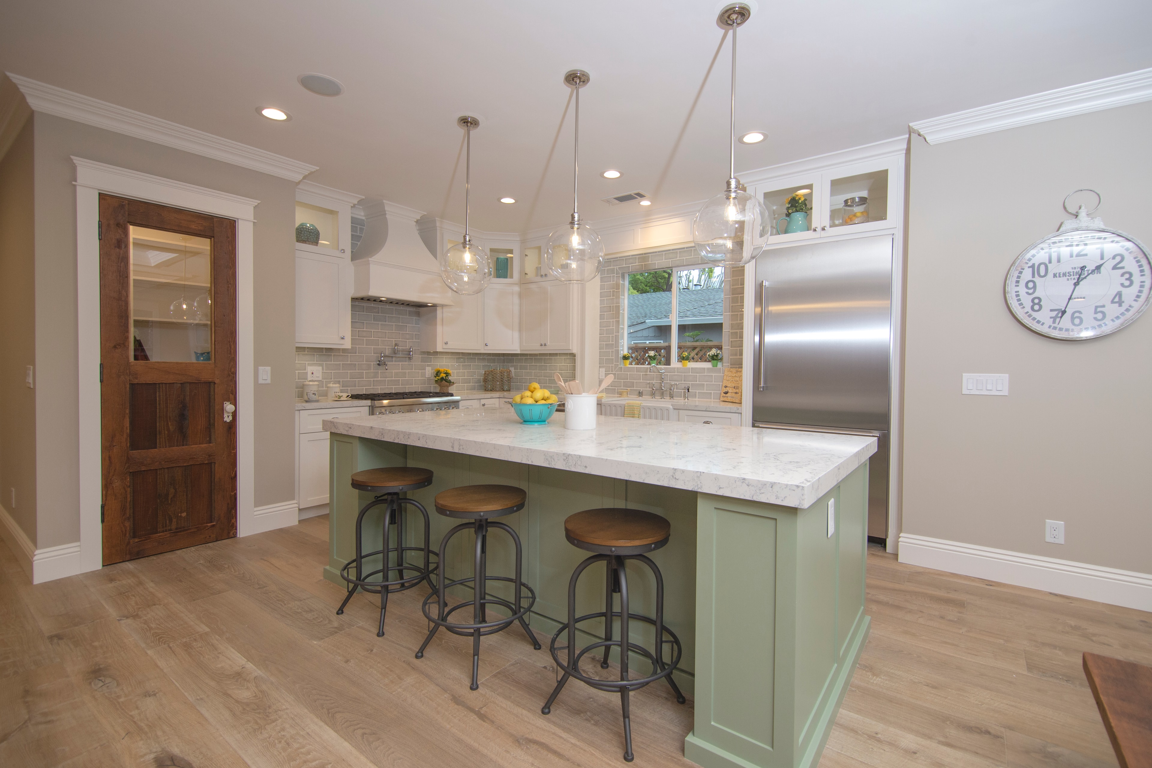 Sage green island kitchen